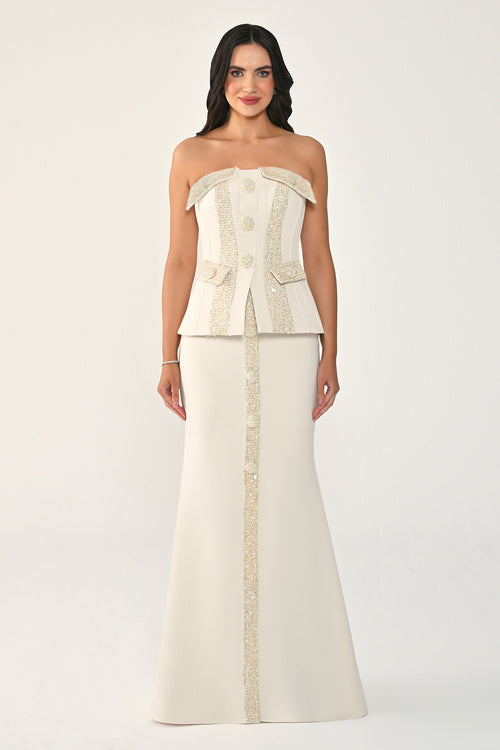 فستان كريب طويل بدون حمالات مزين بالترتر وأزرار